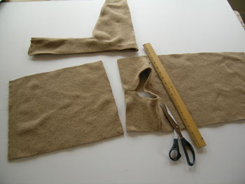 You should be able to get a large rectangle from the front and the back, 12 inches wide by as much as 18 inches long. The sleeves will yield a smaller rectangle.